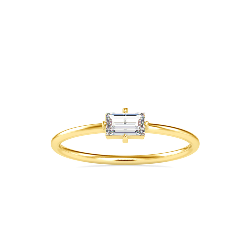 baguette solitaire diamond ring in yellow gold