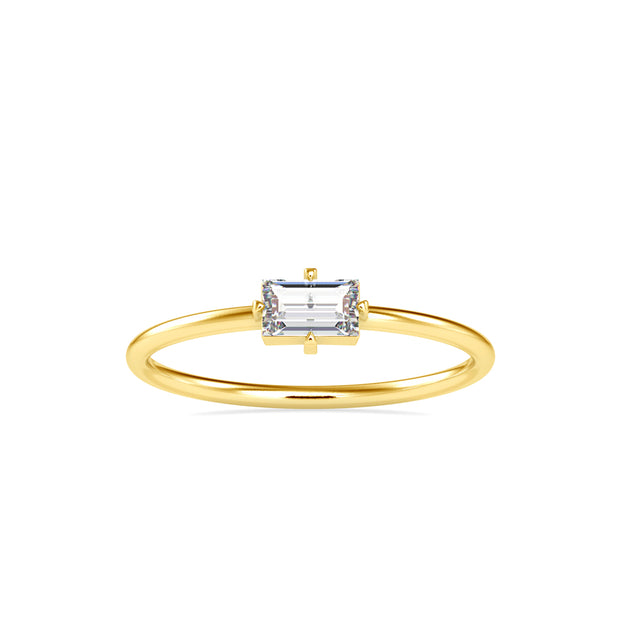 baguette solitaire diamond ring in yellow gold