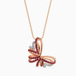 Butterfly-shaped pendant with red gemstones and rose gold chain