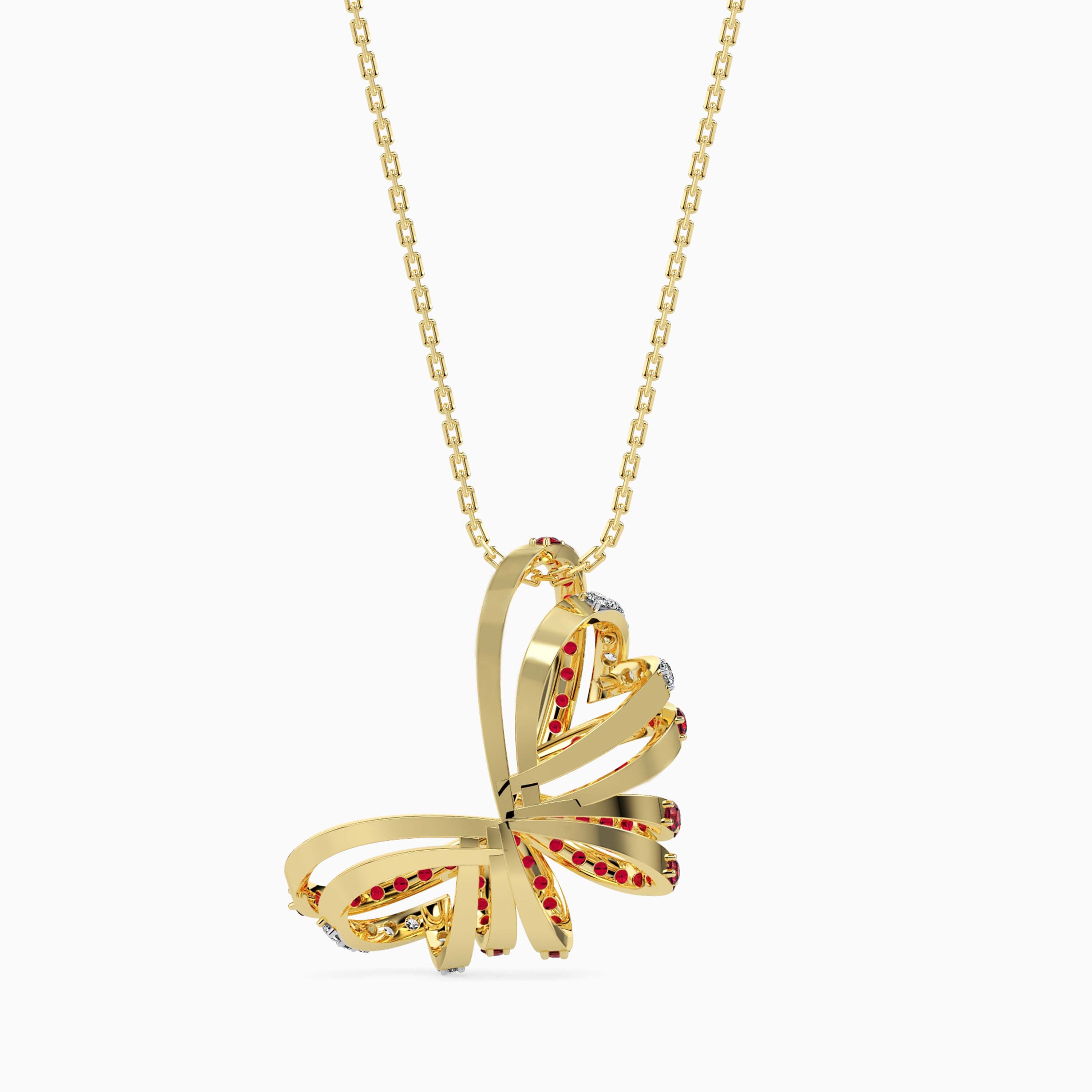 Gold butterfly pendant necklace with red stones on a white background