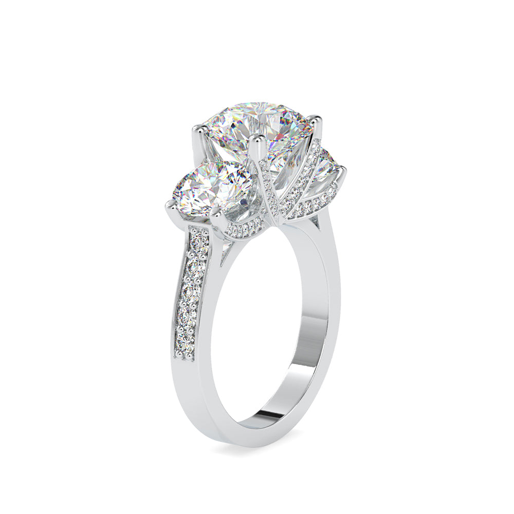 round cut three stone lab-grown diamond ring in white gold
