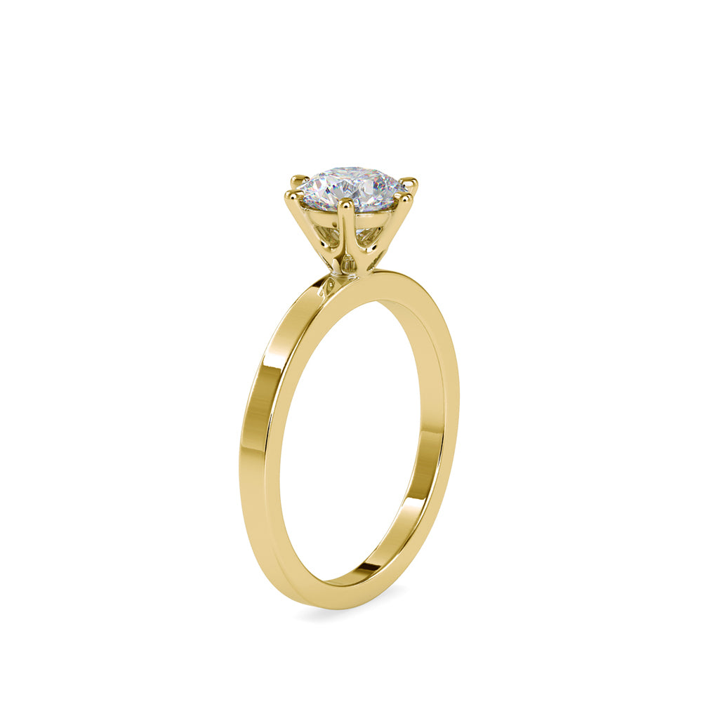 round cut solitaire lab-grown diamond ring in yellow gold