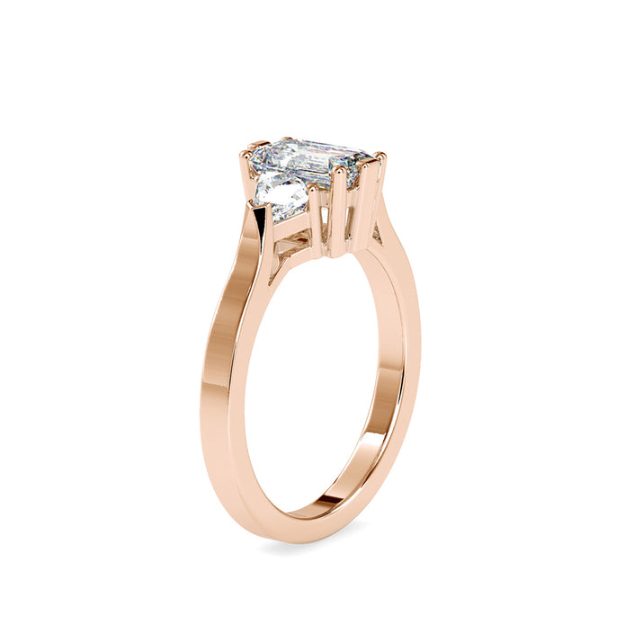 emerald cut three stone lab-grown diamond ring in rose gold