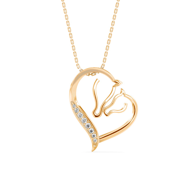 two horse heads shape diamond pendant necklace in yellow gold