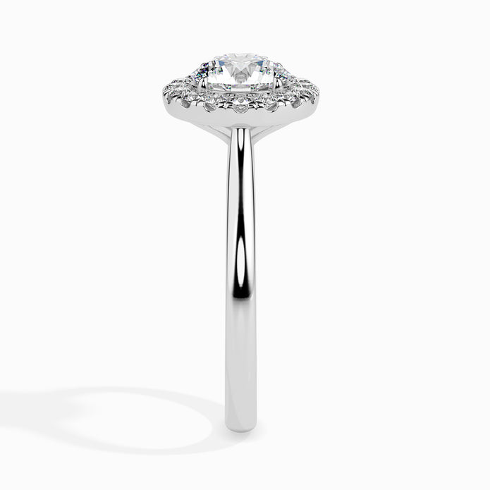 round cut halo diamond ring in white gold