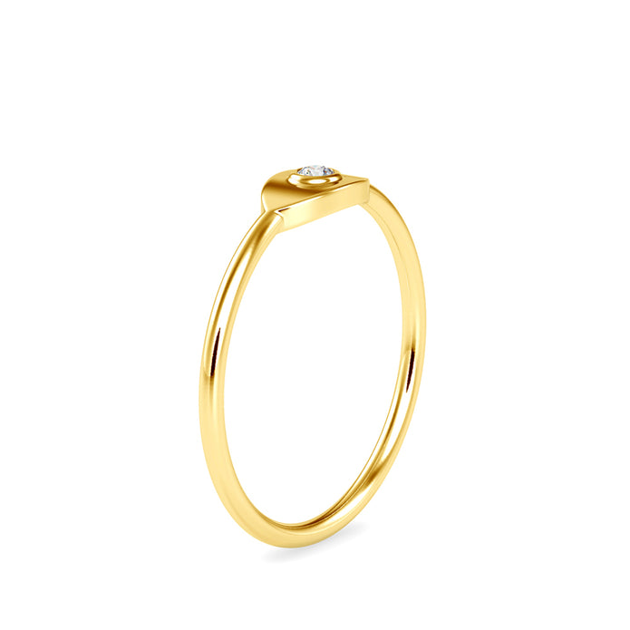 evil eye bezel diamond ring in yellow gold