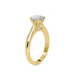round cut prong set lab-grown diamond ring in yellow gold
