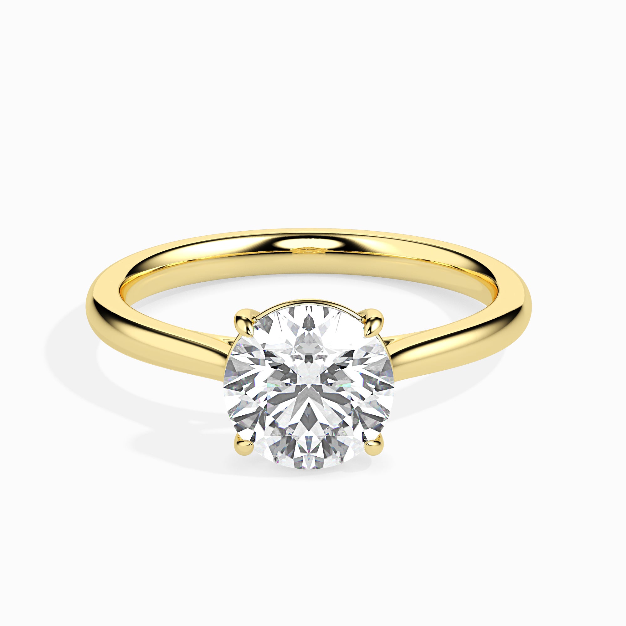 round cut solitaire diamond ring in yellow gold