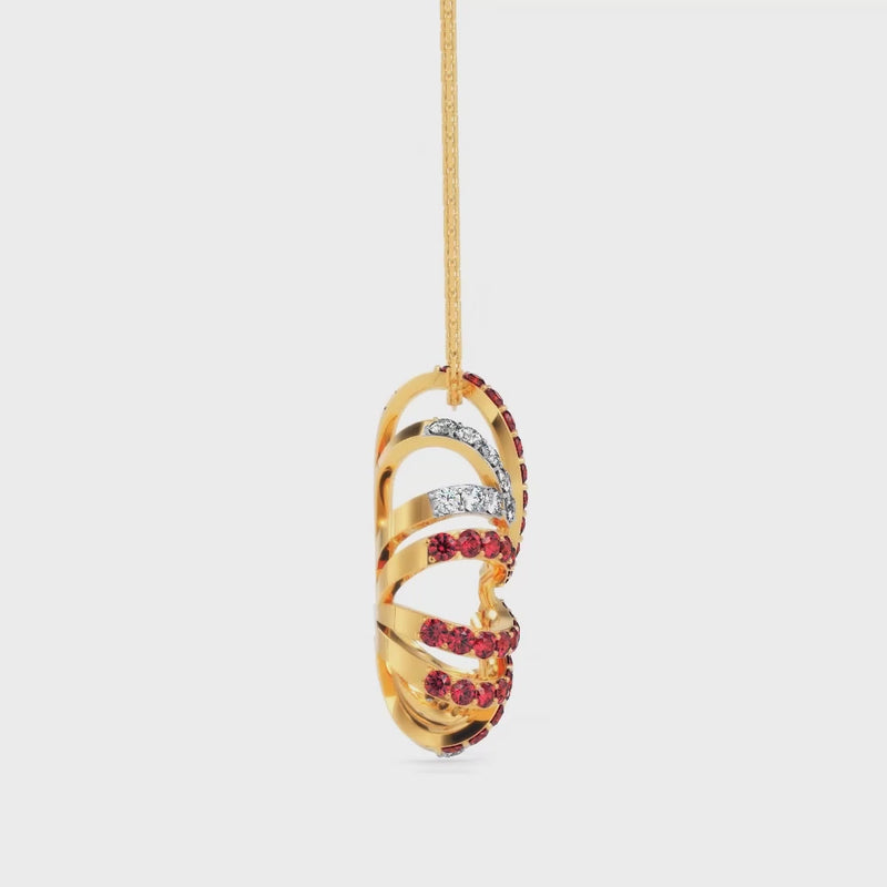Butterfly-shaped pendant with red gemstones and rose gold chain with yellow gold