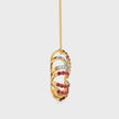 Butterfly-shaped pendant with red gemstones and rose gold chain with yellow gold
